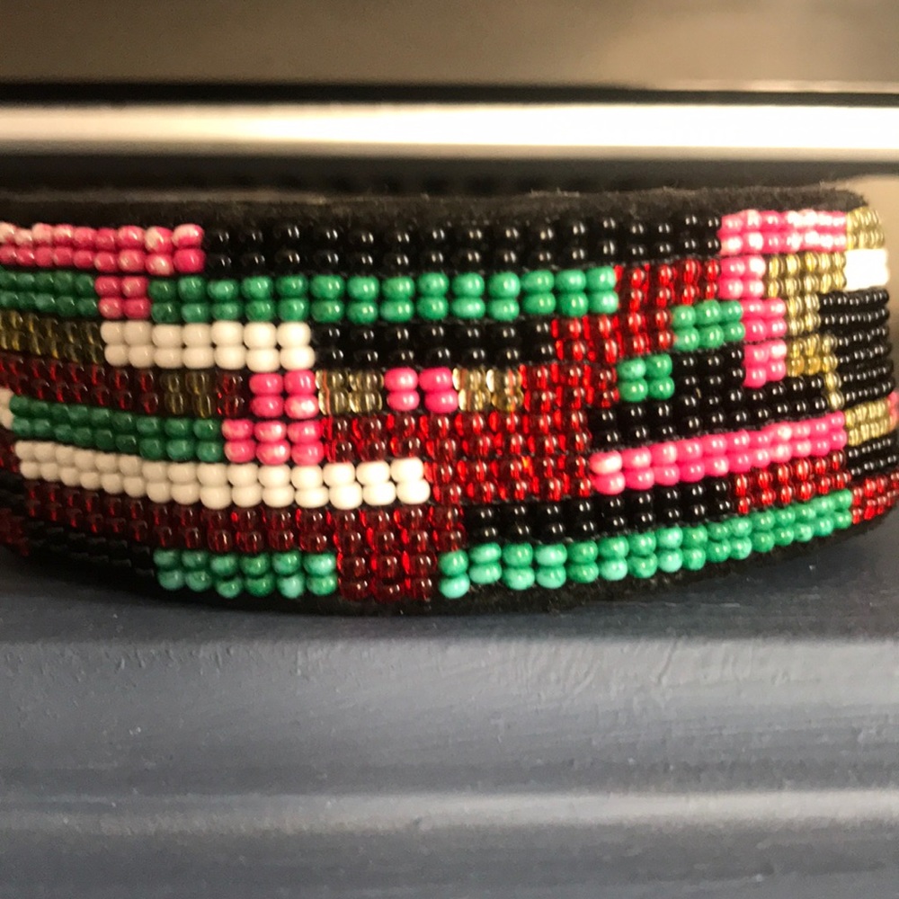 Adjustable Madison Scotch and Soda bracelet.